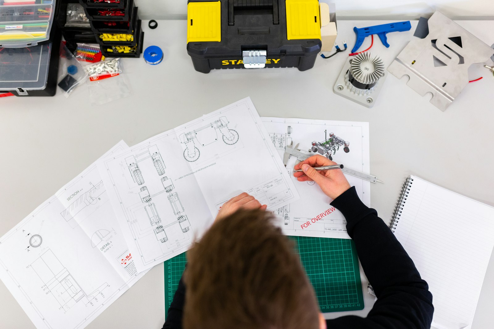 A Glue IT technician working on site - hands-on installs, done properly